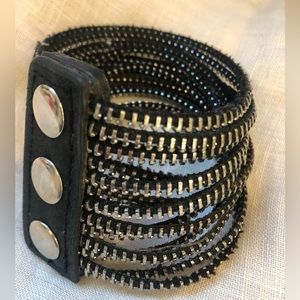 Black and silver button clasp cuff bracelet. Fashion bracelet faux leather.